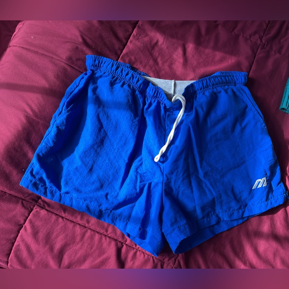 Blue and Grey Mizuno lined athletic shorts